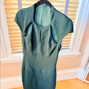 Forrest green Monique Lhuillier dress. Size 6. Wool;w/ cute cutouts in the front